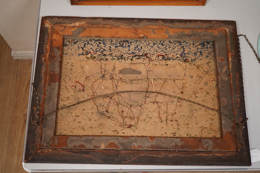 A maple framed 19th century ‘woolie’ folk art, wool work embroidery of a fully rigged sailing ship. Embroidered by a sailor using wading, creating raised stump work sails, using long straight stem stitches both verticall